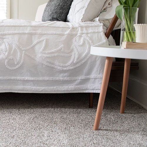 white bed on carpet - Tymeless Flooring LA
