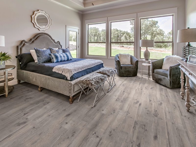 bedroom with hardwood - Tymeless Flooring in Slidell, LA