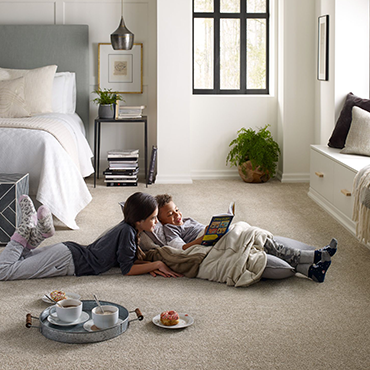 children reading on carpet - Tymeless Flooring LA